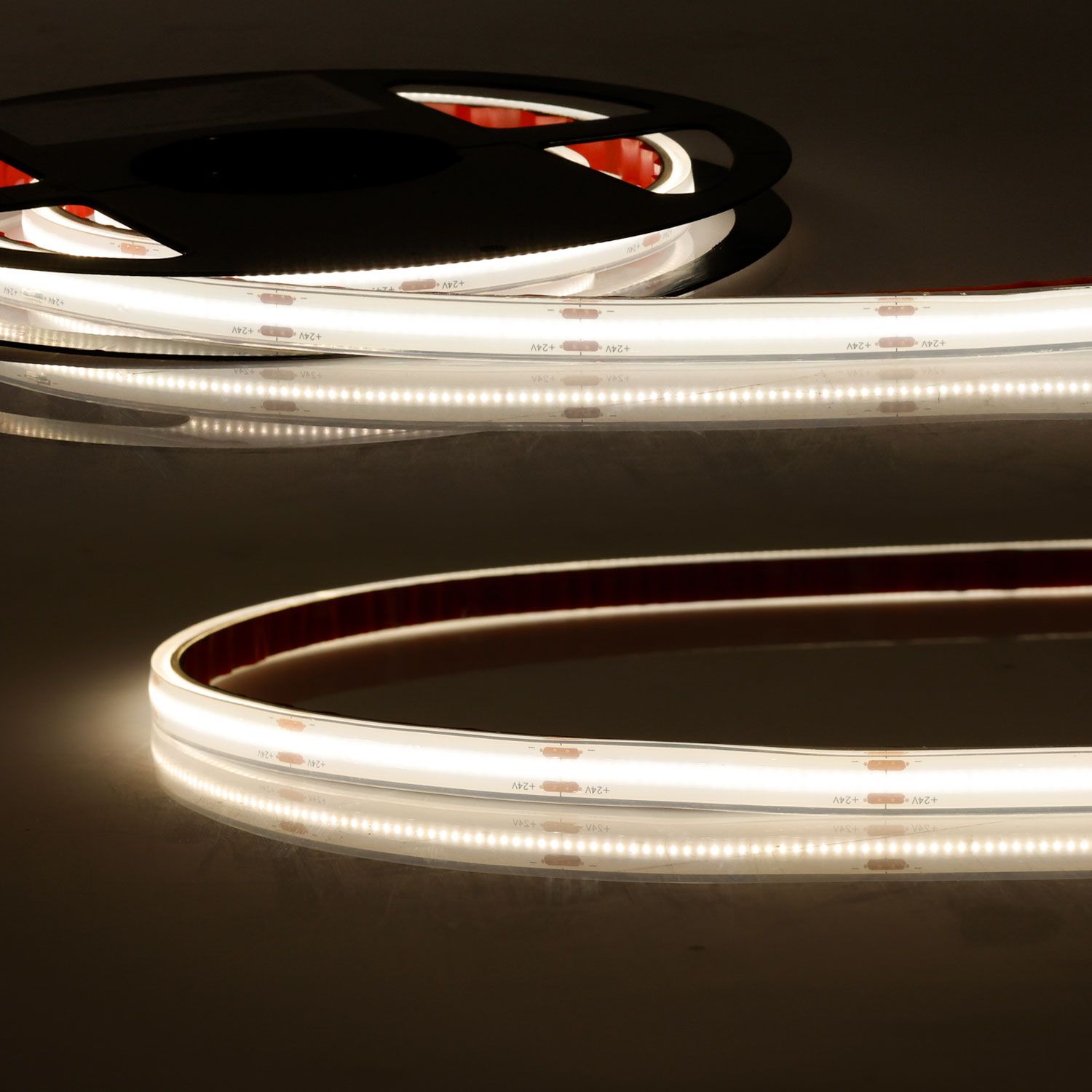 LED riba HT930 COB 14,4W/m, 24V, 3000K, 90lm/W, 110°, 100°C (kuumakindel), IP68, lõige 5cm, 5000x11x5mm